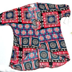 NWT kids light weight cover up. Oversized size 2 fits kids sizes 6-10